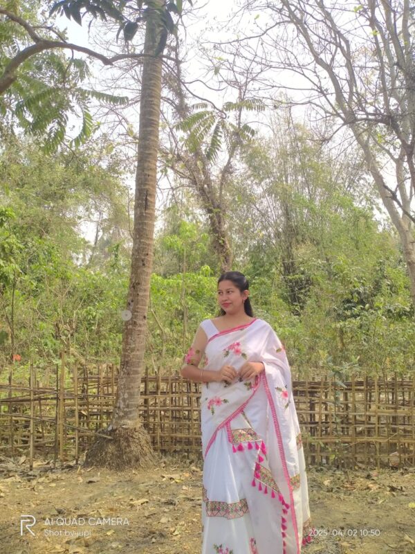 Hand-Embroidered White Saree with Pink Floral and Tassel Design - Image 2
